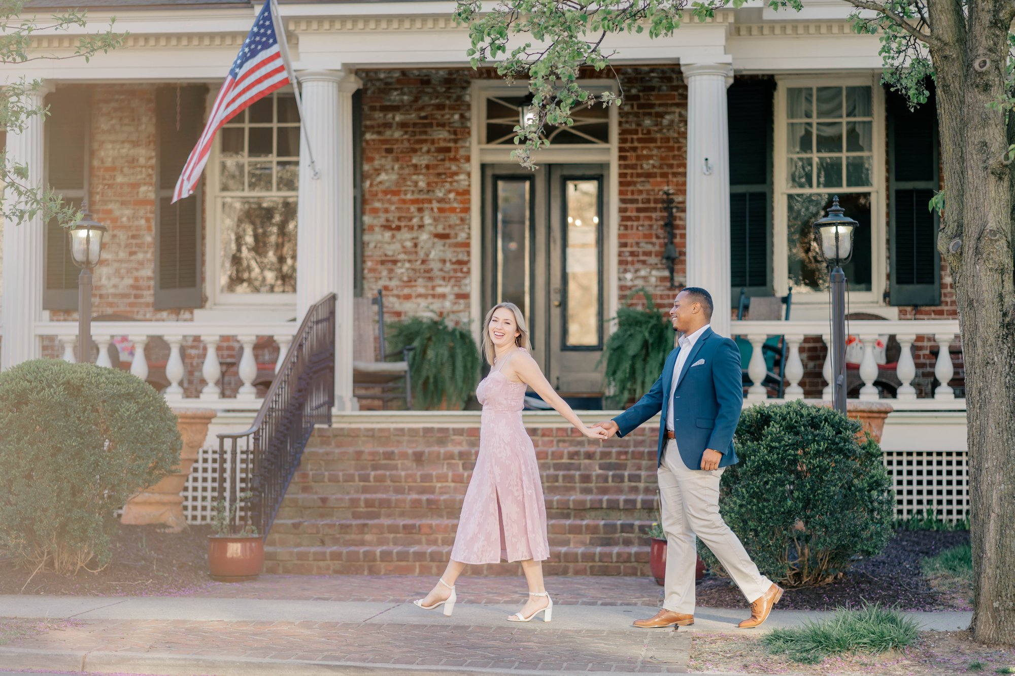 Engagement photo session image of an engaged couple in downtown Fredericksburg, Virginia captured by Stephanie Grooms Artistry